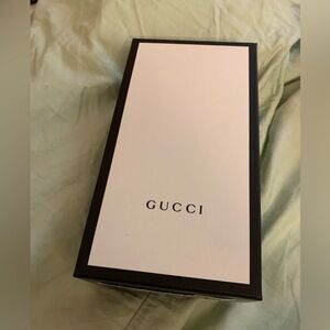 Gucci authentic box with black authentic Gucci logo ribbon.Great for collectors.
